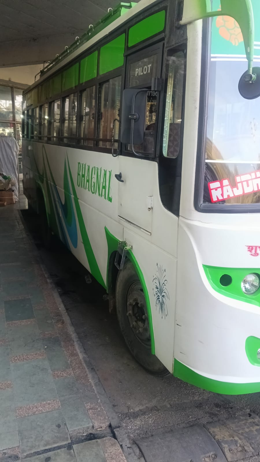 Bhagnal Travels bus angled side view
