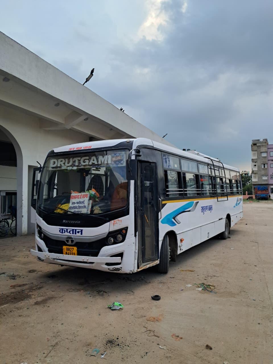 Drutgami bus front angled, cloudy sky